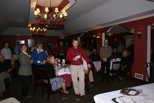 Active Members stand to receive silver trimmed "Challenge Coins"  Annual Banquet 5/18/2012